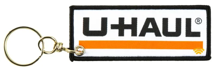Custom rubber key fobs with U-Haul corporate truck branding