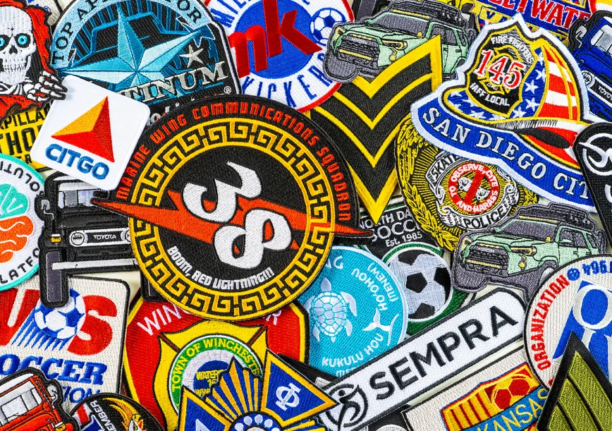 Close-up comparing low stitch density vs high thread-count custom emblem legibility