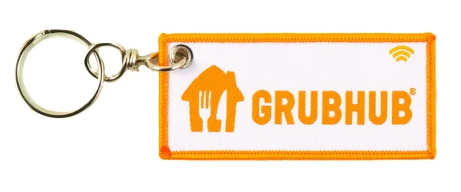 Branded promotional custom keychains and matching patches made for Grubhub couriers