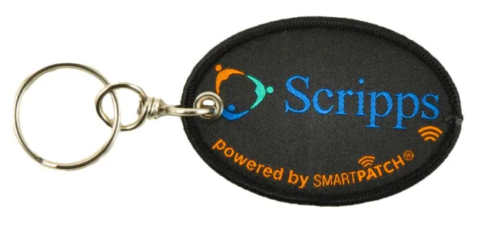 Custom molded PVC corporate promotional keychain designed for Scripps Health